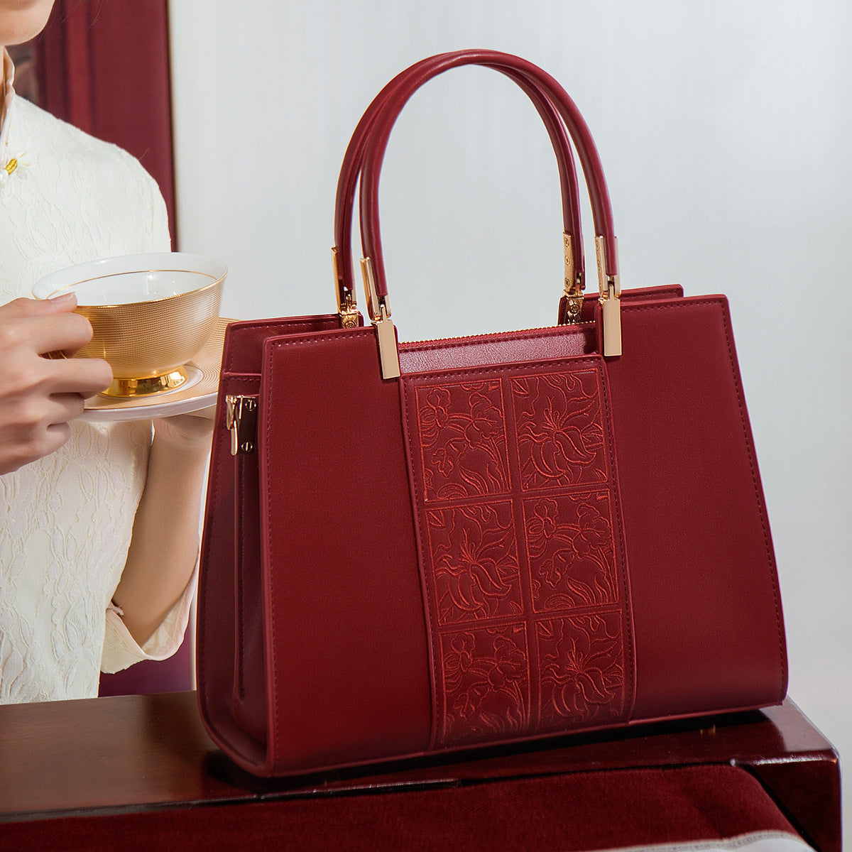 High-end Red Handbag